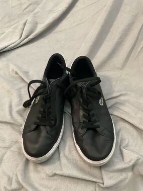 Lacoste women’s Black Sneakers with White Sole